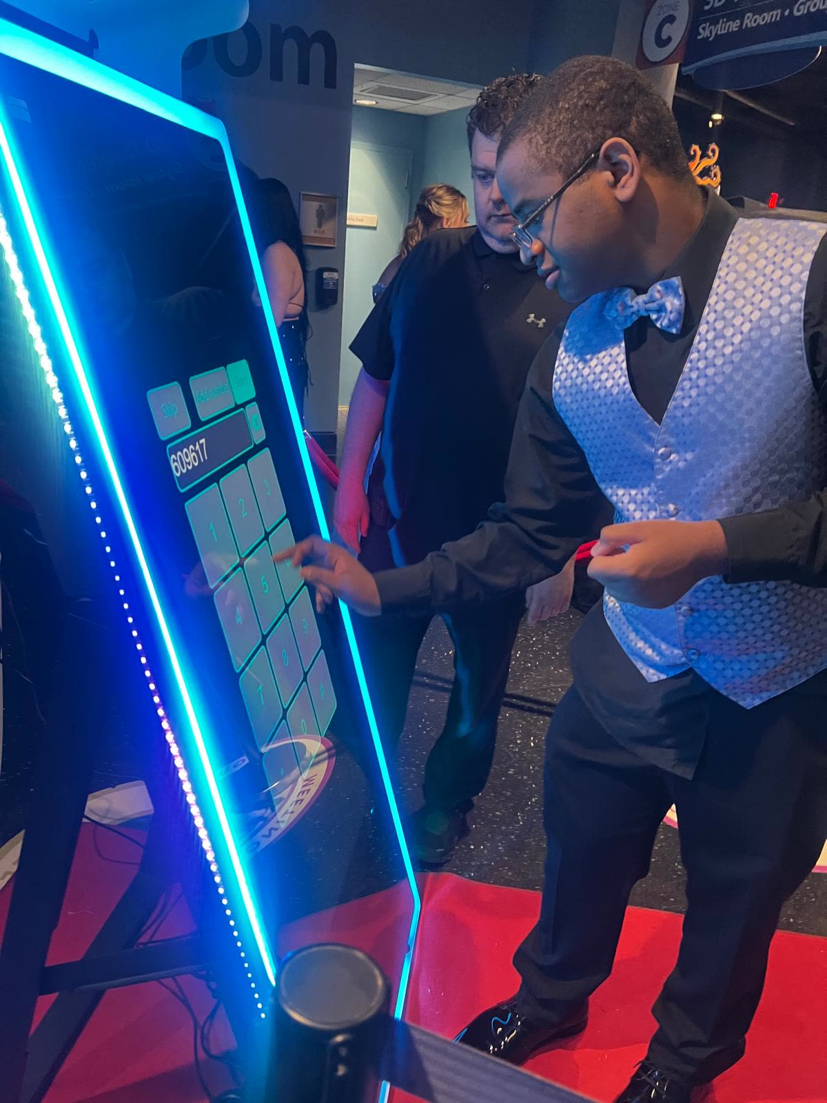Elegant magic mirror booth at a venue